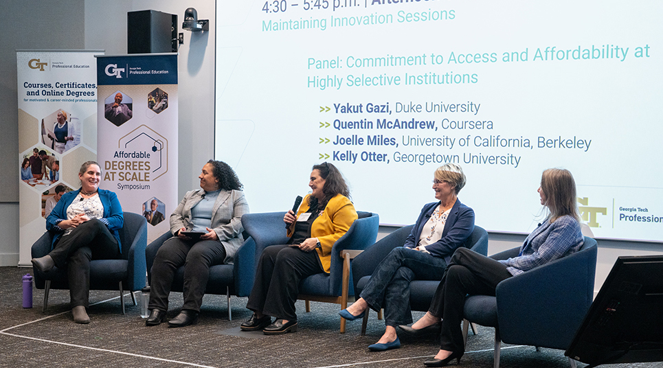 Scholars speaking at a panel from 2024